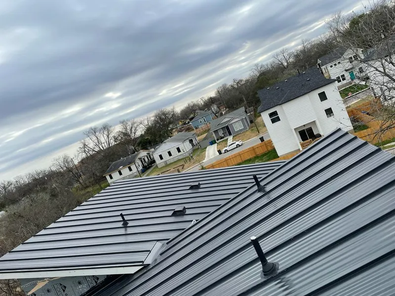 Standing seam metal roof panels with vents for Skylight Repair in Bellaire